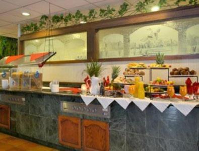Merced Inn & Suites Restaurang bild